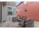 Comfortable outdoor patio with cozy seating and decorative string lights overhead at 21451 E 60Th Ave, Aurora, CO 80019