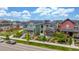 Street view showcasing the colorful houses and well-maintained landscaping at 21451 E 60Th Ave, Aurora, CO 80019