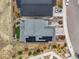 Stunning aerial view of a home with a well-maintained yard and solar panels at 9021 Swan River St, Littleton, CO 80125