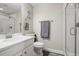 Elegant bathroom with a glass-enclosed shower and modern fixtures at 9021 Swan River St, Littleton, CO 80125