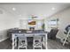 Inviting living room with a cozy fireplace and comfortable seating at 9021 Swan River St, Littleton, CO 80125