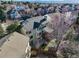 Aerial view of a home, featuring a well-manicured lawn, spacious patio, and a serene backyard, nestled in a friendly neighborhood at 853 Huntington Dr, Highlands Ranch, CO 80126