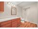 Bathroom features a walk-in shower, wood flooring and vanity at 853 Huntington Dr, Highlands Ranch, CO 80126