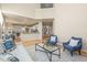 Spacious living room with an open floor plan, hardwood floors, and plenty of natural light, ideal for gatherings at 853 Huntington Dr, Highlands Ranch, CO 80126