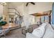 Open concept living room and dining area featuring vaulted ceiling, staircase and contemporary decor at 853 Huntington Dr, Highlands Ranch, CO 80126