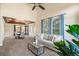 Beautiful living room features access to the dining area, and lots of natural light at 853 Huntington Dr, Highlands Ranch, CO 80126