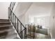 Open floor plan with stairs leading to the living room and sliding door accessing the backyard at 9316 W Utah Ave, Lakewood, CO 80232