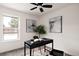 Home office with natural light, modern desk, and neutral decor at 9316 W Utah Ave, Lakewood, CO 80232