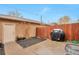 Private backyard featuring rock landscaping, a covered grill, and fenced yard at 2686 S Cherokee St, Denver, CO 80223