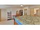 Spacious bedroom with a bed and furniture; natural light entering through the windows at 2686 S Cherokee St, Denver, CO 80223