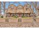 Attractive townhome exteriors with covered patios and stone accents in a well-maintained community at 2686 S Cherokee St, Denver, CO 80223
