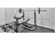 Home gym featuring weightlifting and strength training equipment on black rubber floor at 2686 S Cherokee St, Denver, CO 80223