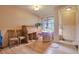 Versatile living space with hardwood floors, great natural light, and neutral paint tones at 2686 S Cherokee St, Denver, CO 80223