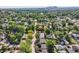 Aerial view of neighborhood with mature trees and the subject property outlined in red at 2692 N Raleigh St, Denver, CO 80212