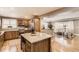 Spacious kitchen with a central island and seamless flow to the living area at 2692 N Raleigh St, Denver, CO 80212