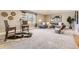 Spacious living room with a comfortable gray sectional sofa, stylish decor, and a large window for natural light at 2692 N Raleigh St, Denver, CO 80212