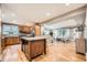 Bright living space with hardwood floors, an open kitchen, and seamless flow for modern living at 2692 N Raleigh St, Denver, CO 80212