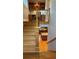 Staircase with hardwood treads leading to the upper levels, providing seamless transitions throughout the home at 2692 N Raleigh St, Denver, CO 80212