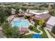 A bird's eye view of a recreational facility with a pool, fitness center, and green spaces for residents to enjoy at 9856 Keenan St, Highlands Ranch, CO 80130