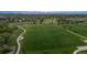 Scenic aerial view of a large park with walking trails and green spaces at 9856 Keenan St, Highlands Ranch, CO 80130