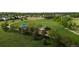 A well-maintained park featuring a playground, picnic area, and green space, creating a Gathering-friendly environment at 9856 Keenan St, Highlands Ranch, CO 80130