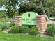 The Big Dry Creek Park sign with stone pillars and lush greenery at 9856 Keenan St, Highlands Ranch, CO 80130