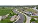 Aerial view of a park and recreational area with playgrounds and sports fields at 9856 Keenan St, Highlands Ranch, CO 80130