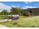 View of Redstone Elementary School sign surrounded by greenery at 9856 Keenan St, Highlands Ranch, CO 80130