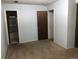 Bedroom features neutral walls, carpeted floor, and two entry points to other rooms at 16359 W 10Th Ave # 1, Golden, CO 80401