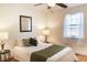 Cozy bedroom with a comfortable bed and natural light at 2294 W Parkhill Ave, Littleton, CO 80120