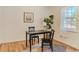 Dining room featuring a table with seating for two and a decorative plant at 2294 W Parkhill Ave, Littleton, CO 80120