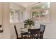 Bright dining area with a table and a view of the backyard at 2294 W Parkhill Ave, Littleton, CO 80120