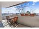 Private balcony with outdoor seating and city views at 601 W 11Th Ave # 311, Denver, CO 80204