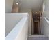 Bright hallway on the 2nd floor with a closet and carpeted floors, showing transition to rooms at 6046 Keyser Pl, Brighton, CO 80601