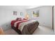 Comfortable bedroom with a large window providing a scenic view at 25019 N Mountain Park Dr, Evergreen, CO 80439