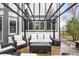 Cozy outdoor patio with comfortable seating and overhead pergola, perfect for relaxing at 17705 W 63Rd Dr, Golden, CO 80403