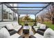 Charming patio seating area with string lights and views of the well-maintained backyard at 17705 W 63Rd Dr, Golden, CO 80403