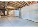Unfinished basement with exposed ceiling and foundation, ready for customization at 710 Belay St, Erie, CO 80516
