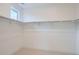 Spacious walk-in closet with ample hanging space, ready for organization at 710 Belay St, Erie, CO 80516
