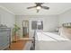 Bright bedroom with natural light, hardwood floors, and a ceiling fan at 2830 Forest St, Denver, CO 80207
