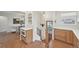 Inviting entryway with hardwood floors, white accents, wood details, and access to the dining area at 2830 Forest St, Denver, CO 80207