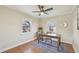 Home office with wood floors, a large table, and bright windows at 2830 Forest St, Denver, CO 80207