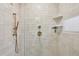 Elegant shower featuring white tiling and bronze fixtures at 2830 Forest St, Denver, CO 80207