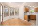 Sun-drenched breakfast nook with hardwood floors and ample natural light at 2072 Skylark Ct, Longmont, CO 80503