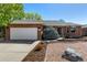 Beautiful brick home with a two-car garage and a well-maintained front yard at 2072 Skylark Ct, Longmont, CO 80503
