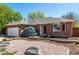 Charming single-story brick home featuring a well-manicured front yard and a two-car garage at 2072 Skylark Ct, Longmont, CO 80503