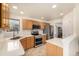 Well-equipped kitchen with stainless steel appliances, and wooden cabinets at 2072 Skylark Ct, Longmont, CO 80503