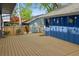 Spacious back deck with stylish accents, ideal for relaxing and outdoor enjoyment at 7659 S Rosemary Cir, Englewood, CO 80112