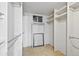 Walk-in closet with built-in shelving, providing organized storage solutions at 7659 S Rosemary Cir, Englewood, CO 80112