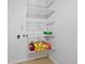 Organized pantry with white wire shelving, great for storage and accessibility at 7659 S Rosemary Cir, Englewood, CO 80112